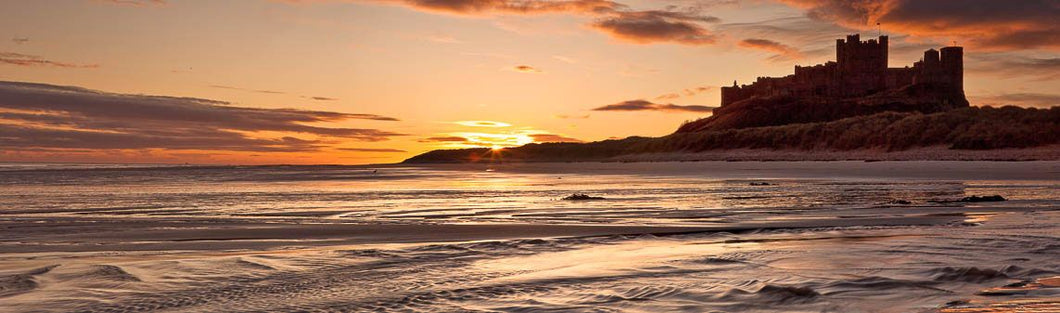Bamburgh Castle sun Ref-PC446