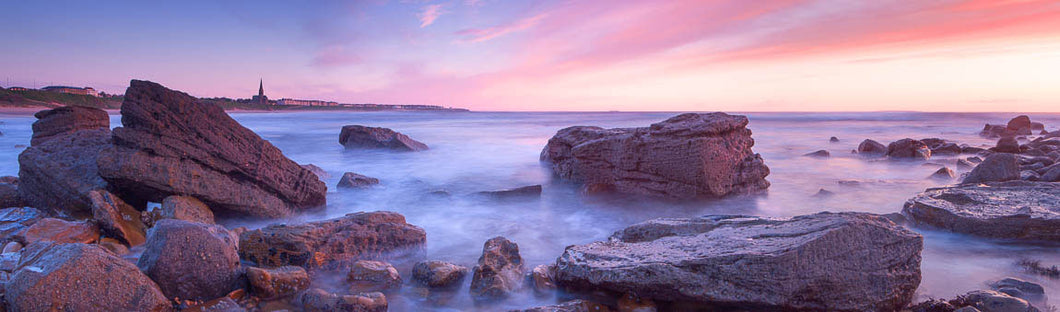 Tynemouth Longsands rocks at dawn panoramic photograph